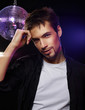 Good looking male on a disco