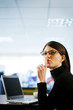 Businesswoman showing hushing sign