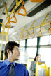 Businessman sitting in a bus