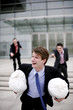 Businessman running after stealing two bags of money
