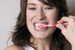 Woman brushing her teeth
