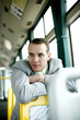 Businessman daydreaming while sitting in the bus