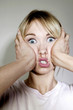 Woman pressing her face