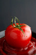 Tomato on tomato sauce.