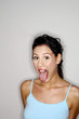 Woman sticking out her tongue