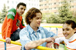 Teenagers hanging out at the field after school