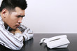 Foto: Businessman waiting by the side of telephone Businessman waiting by the side of telephone
