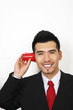 Foto: Businessman playing with plastic cup phone Businessman playing with plastic cup phone