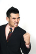 Angry businessman clenching teeth