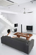 Guy in a spacious living room