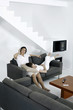 Couple resting in living room