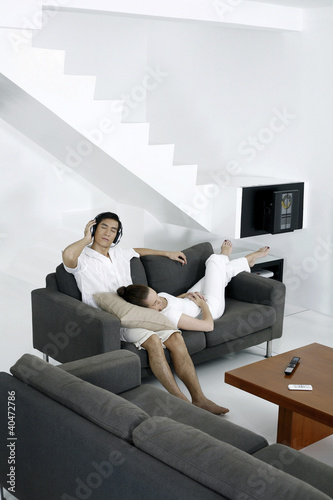 Couple resting in living room
