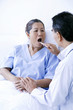 Doctor and patient in ward