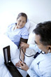 Doctor measuring blood pressure