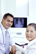 Doctor consulting patient