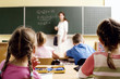 Children and teacher in the classroom