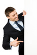 Businessman showing blank signboard, isolated Businessman showing blank signboard, isolated
