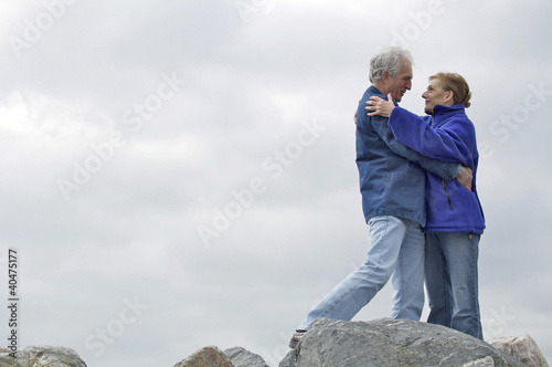 Photo: A mature couple embracing each other A mature couple embracing each other