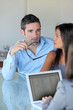 Couple meeting financial adviser for investment