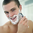 Man shaving his face