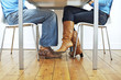 Legs under the table