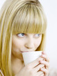 A woman drinking coffee