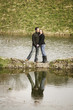 Couple holding hands at the lake