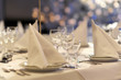 Glasses and plates on table in restaurant Glasses and plates on table in restaurant