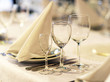 Glasses and plates on table in restaurant Glasses and plates on table in restaurant