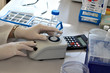 Photo: Vortexing the sample Vortexing the sample