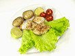 Fried white fish on a plate, vegetables