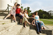Group of Teenagers sitting on the stair, smiling