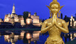 A Golden Kinnari statue demonstrating Sawaddee action