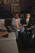 Businessman handing credit card to the waiter