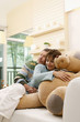 Man hugging woman, woman hugging teddy bear