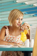 Woman with a glass of orange juice