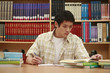 Man studying in the library