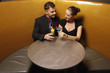 Man and woman enjoying their drinks
