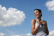 Woman holding toothbrush and toothpaste