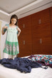 Woman choosing clothes