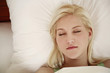 Woman sleeping in bed