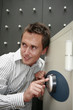 Businessman cracking a safe