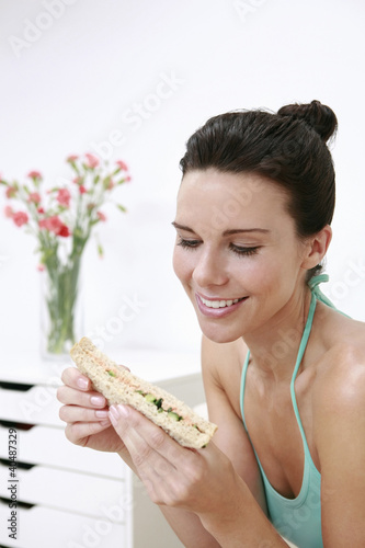 Woman Holding Sandwich