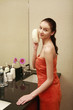 Woman using bath sponge