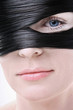 Woman with long hair wrapped around her face