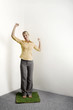 Foto: Businesswoman standing on a patch of grass shaking fist in victory Businesswoman standing on a patch of grass shaking fist in victory