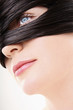Woman with long hair wrapped around her face
