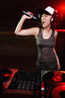 Woman singing into microphone