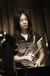 Young woman playing drums