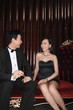 Man and woman talking at a night club